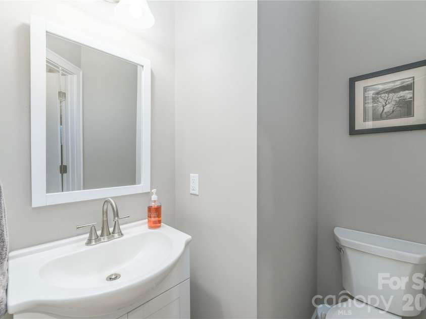 31 Burlington Lane, Fletcher, NC 28732.  MLS# CAR4428063, YatesRealty ID 53513. Half bath down stairs