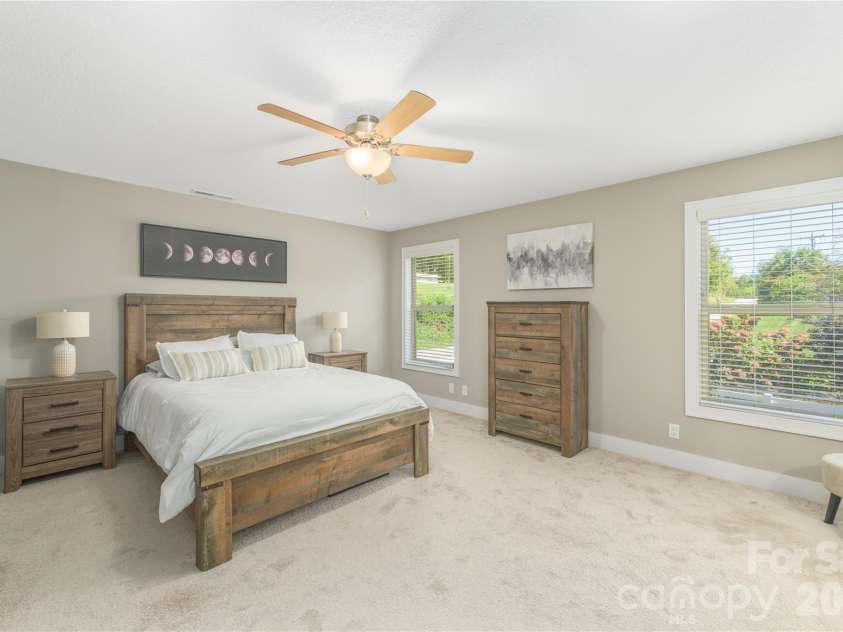 31 Burlington Lane, Fletcher, NC 28732.  MLS# CAR4428063, YatesRealty ID 53513. Primary bedroom very spacious and comfortable