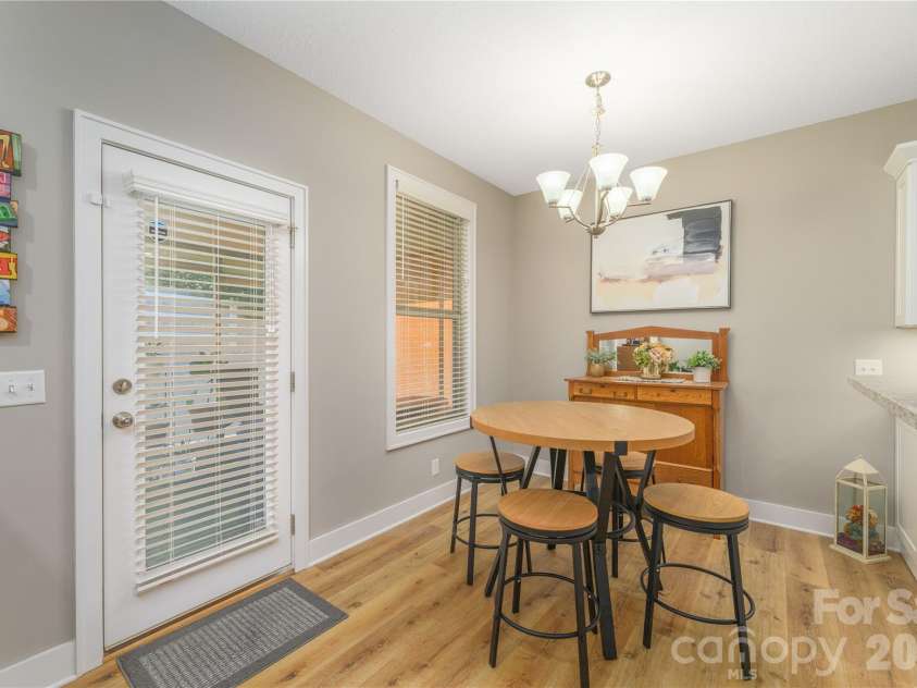 31 Burlington Lane, Fletcher, NC 28732.  MLS# CAR4428063, YatesRealty ID 53513. Small dining area off kitchen