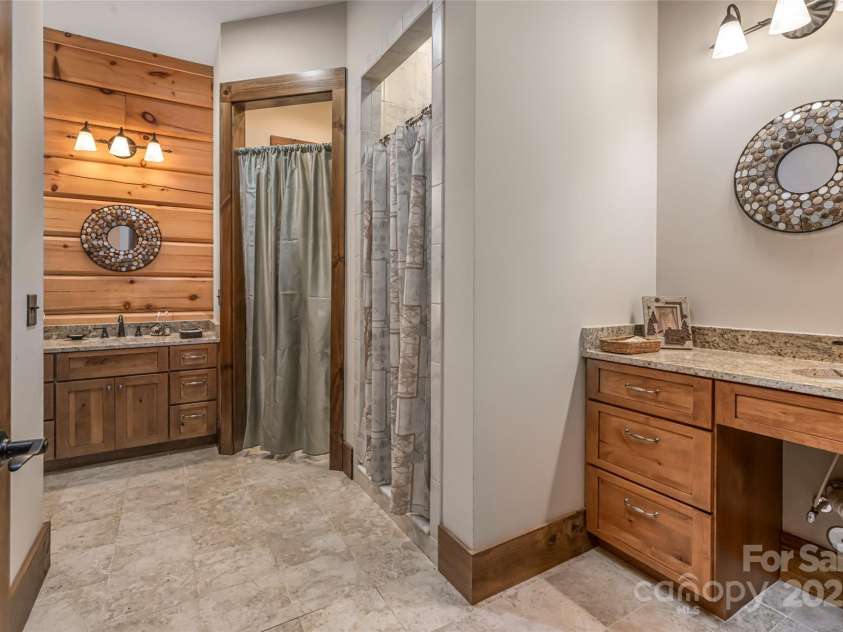 635 Whisper Mountain Drive, Leicester, NC 28748.  MLS# CAR4302796, YatesRealty ID 5352. 2 Sinks Main Level En-suite Bath