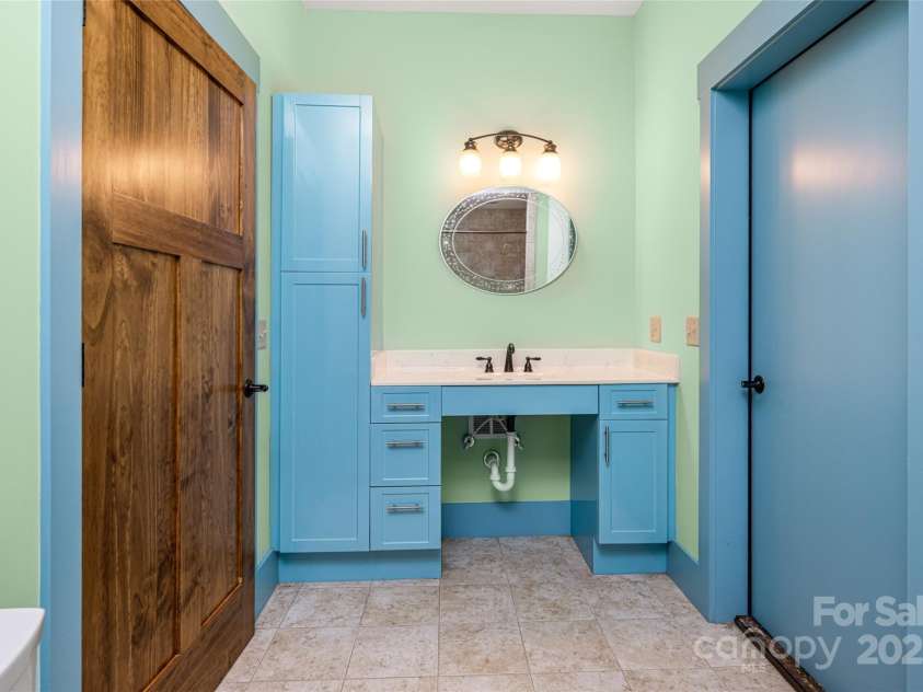 635 Whisper Mountain Drive, Leicester, NC 28748.  MLS# CAR4302796, YatesRealty ID 5352. Access to the indoor pool, swim spa