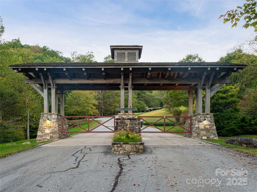 635 Whisper Mountain Drive, Leicester, NC 28748.  MLS# CAR4302796, YatesRealty ID 5352. Gated, low-density community = privacy + peace