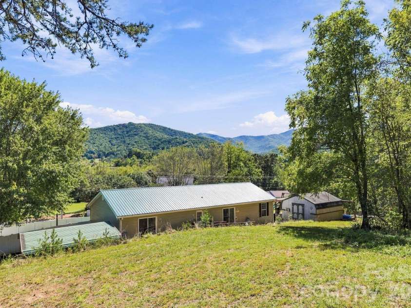 20 Warren Creek Road, Candler, NC 28715.  MLS# CAR4428308, YatesRealty ID 53546. 