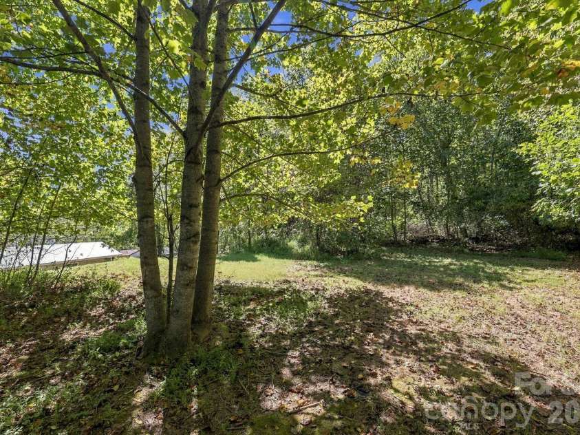 20 Warren Creek Road, Candler, NC 28715.  MLS# CAR4428308, YatesRealty ID 53546. 