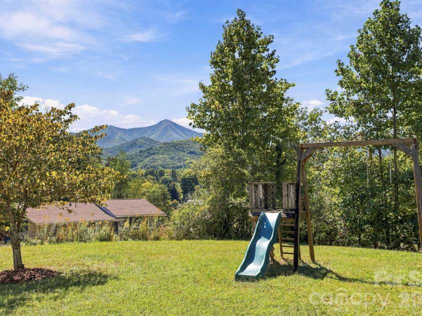 20 Warren Creek Road, Candler, NC 28715.  MLS# CAR4428308, YatesRealty ID 53546. 