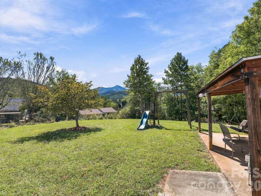20 Warren Creek Road, Candler, NC 28715.  MLS# CAR4428308, YatesRealty ID 53546. 