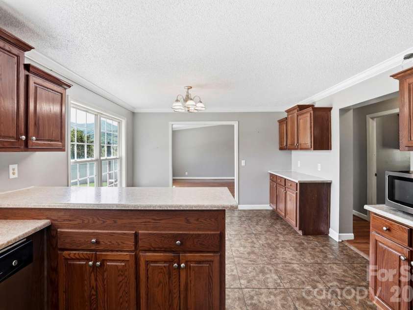 20 Warren Creek Road, Candler, NC 28715.  MLS# CAR4428308, YatesRealty ID 53546. 