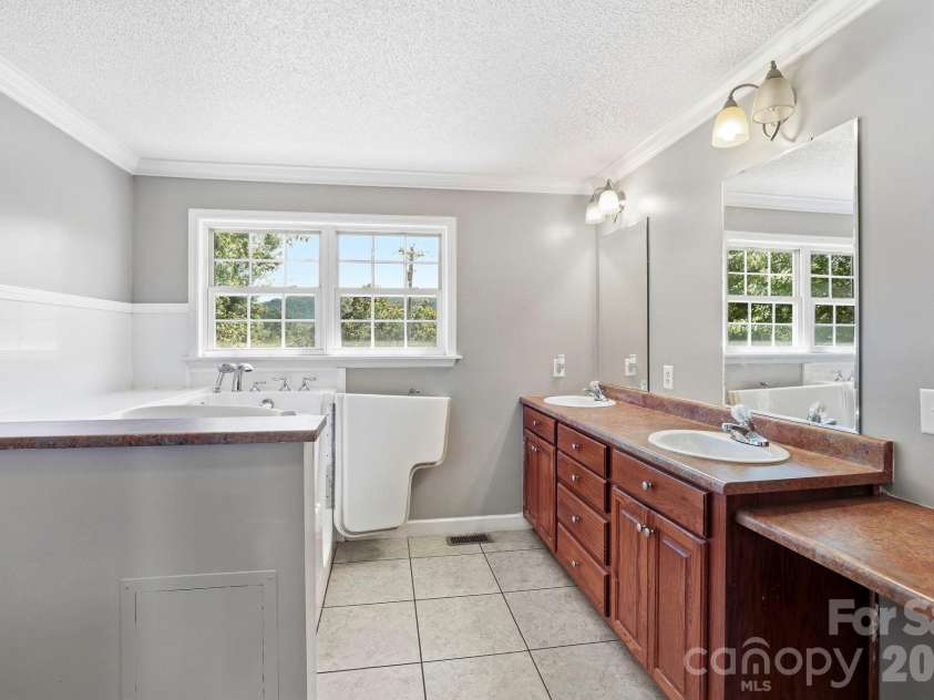 20 Warren Creek Road, Candler, NC 28715.  MLS# CAR4428308, YatesRealty ID 53546. 