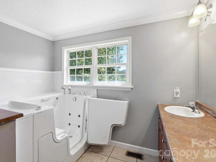 20 Warren Creek Road, Candler, NC 28715.  MLS# CAR4428308, YatesRealty ID 53546. 