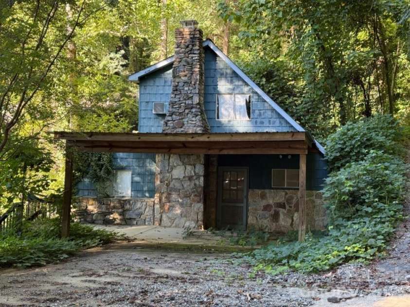 144 Conroy Court, Lake Lure, NC 28746.  MLS# CAR4428368, YatesRealty ID 53548. Protected Wooded Setting
