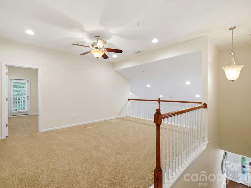 411 Halyard Lane, Tega Cay, SC 29708.  MLS# CAR4429046, YatesRealty ID 53559. Den / Upper Living Area