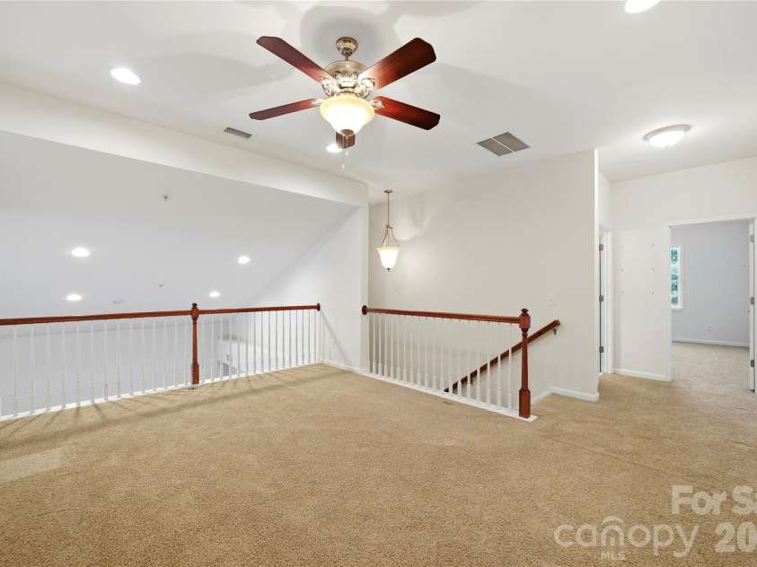 411 Halyard Lane, Tega Cay, SC 29708.  MLS# CAR4429046, YatesRealty ID 53559. Den / Upper Living Area