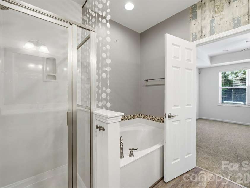 411 Halyard Lane, Tega Cay, SC 29708.  MLS# CAR4429046, YatesRealty ID 53559. Primary Bath