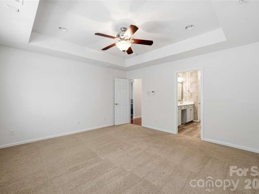 411 Halyard Lane, Tega Cay, SC 29708.  MLS# CAR4429046, YatesRealty ID 53559. Primary Bedroom