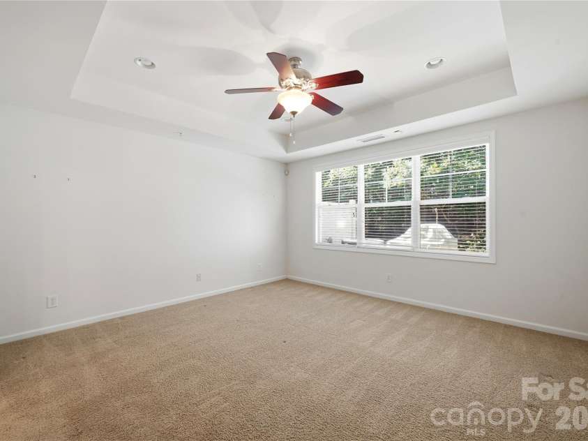411 Halyard Lane, Tega Cay, SC 29708.  MLS# CAR4429046, YatesRealty ID 53559. Primary Bedroom