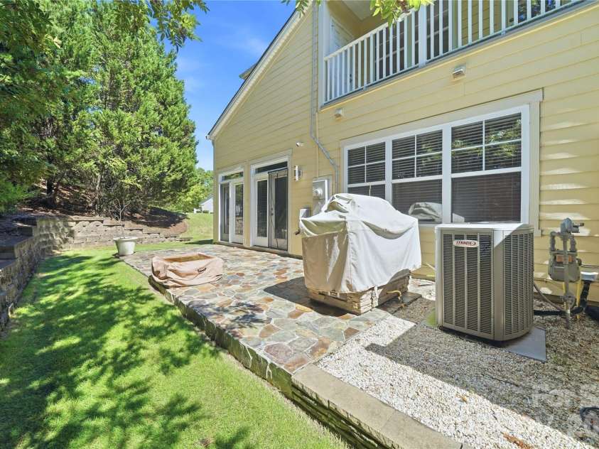 411 Halyard Lane, Tega Cay, SC 29708.  MLS# CAR4429046, YatesRealty ID 53559. Rear Elevation / Patio