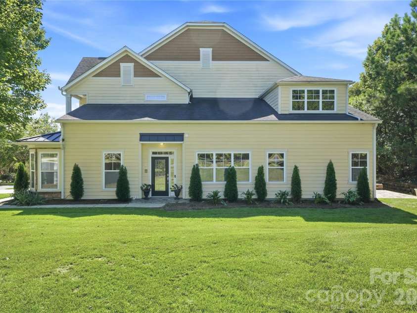 411 Halyard Lane, Tega Cay, SC 29708.  MLS# CAR4429046, YatesRealty ID 53559. Side Elevation / Main Entry