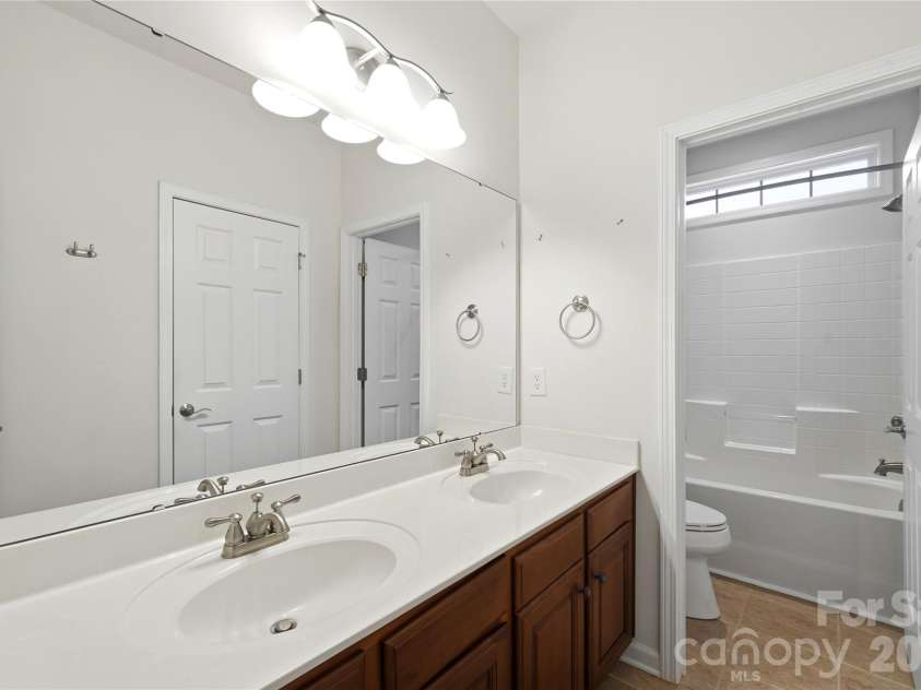 411 Halyard Lane, Tega Cay, SC 29708.  MLS# CAR4429046, YatesRealty ID 53559. Upper Level Full Bath