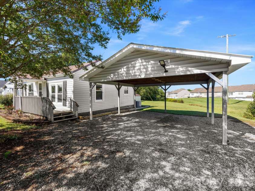 24 Forest Hill Road, Lexington, NC 27295.  MLS# CAR4427630, YatesRealty ID 53572. 2 car carport