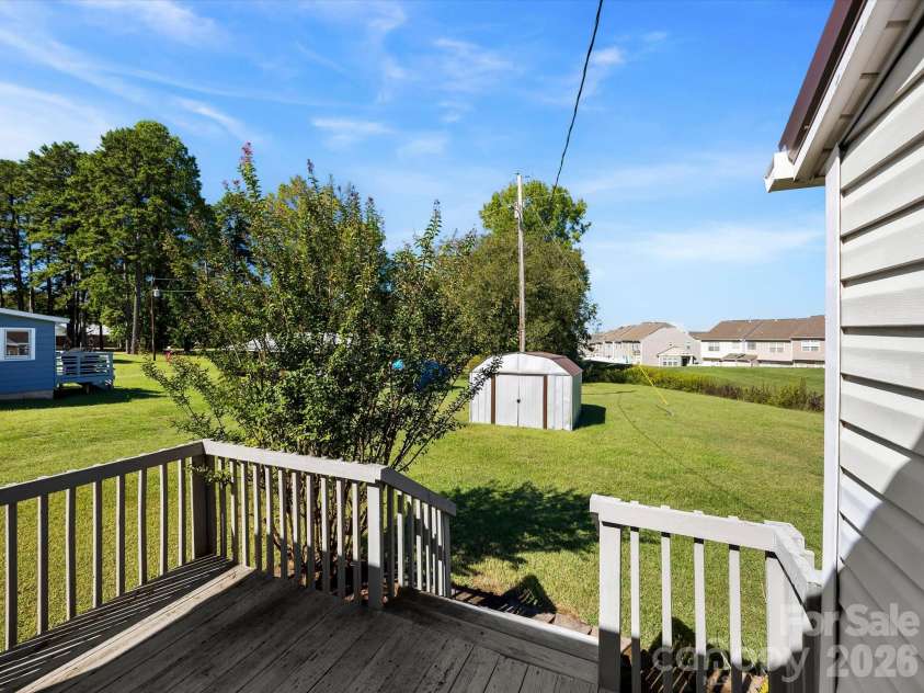 24 Forest Hill Road, Lexington, NC 27295.  MLS# CAR4427630, YatesRealty ID 53572. Deck off back of home