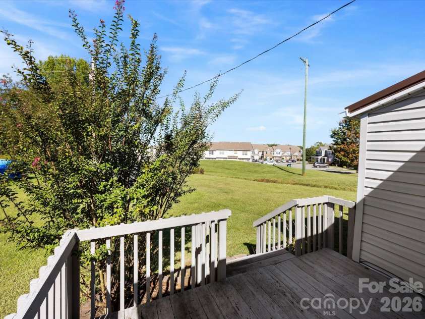 24 Forest Hill Road, Lexington, NC 27295.  MLS# CAR4427630, YatesRealty ID 53572. Deck overlooking large yard