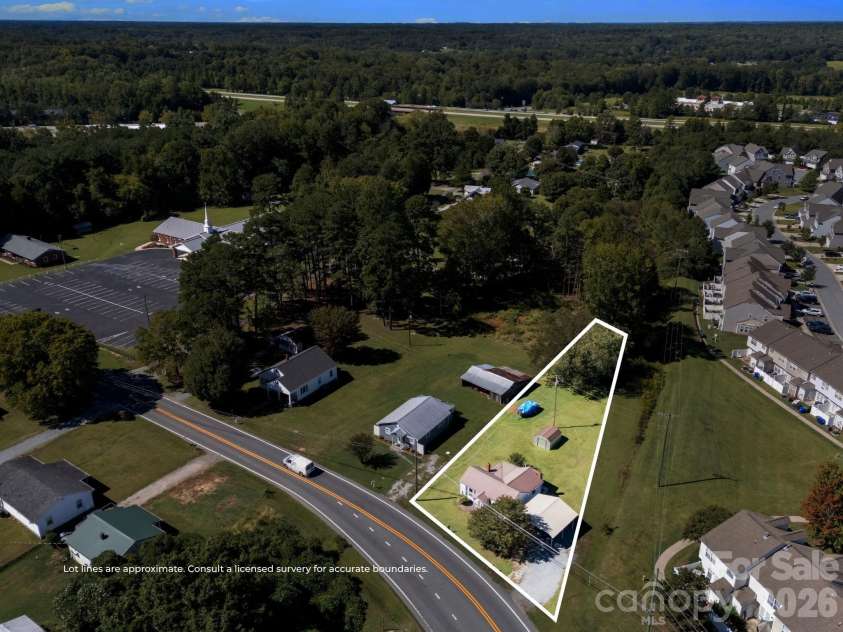 24 Forest Hill Road, Lexington, NC 27295.  MLS# CAR4427630, YatesRealty ID 53572. Lot lines approximate for visual reference only, consult surveyor for accurate boundary lines.