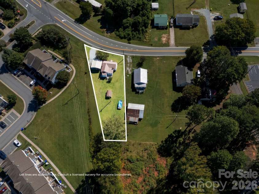 24 Forest Hill Road, Lexington, NC 27295.  MLS# CAR4427630, YatesRealty ID 53572. Lot lines approximate for visual reference only, consult surveyor for accurate boundary lines.