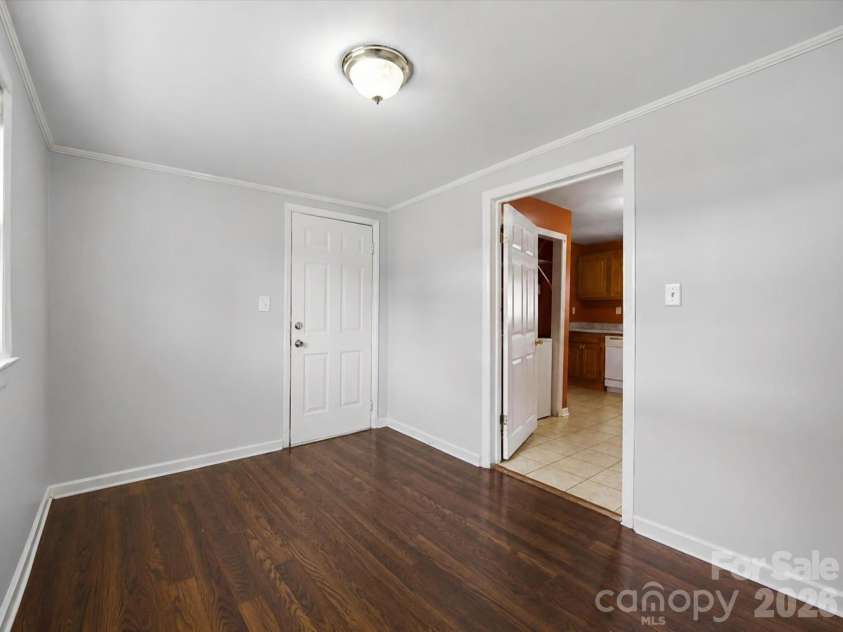 24 Forest Hill Road, Lexington, NC 27295.  MLS# CAR4427630, YatesRealty ID 53572. Second bedroom at back of home