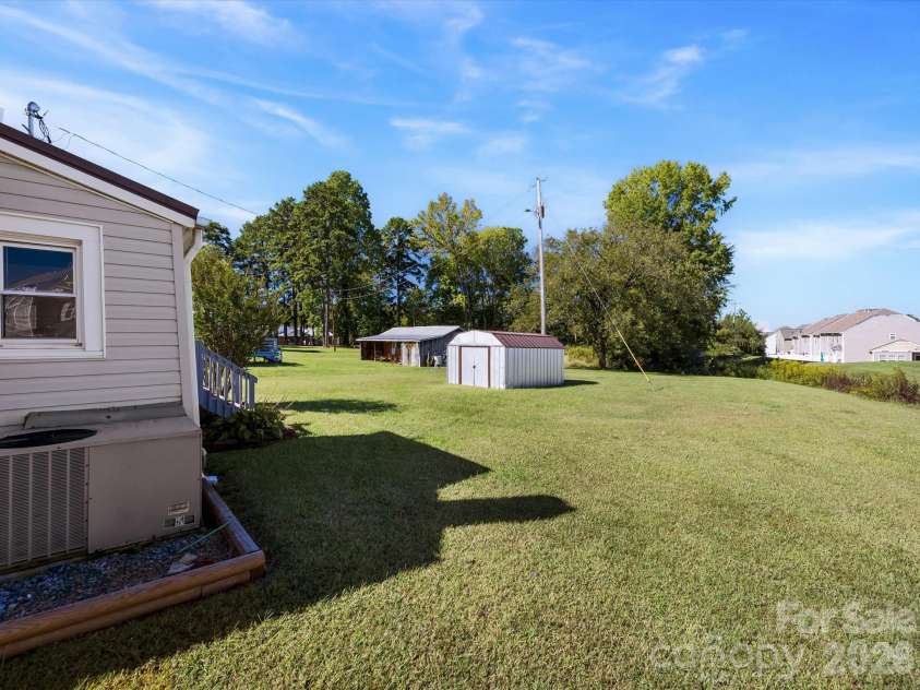 24 Forest Hill Road, Lexington, NC 27295.  MLS# CAR4427630, YatesRealty ID 53572. Storage shed included for additional storage options