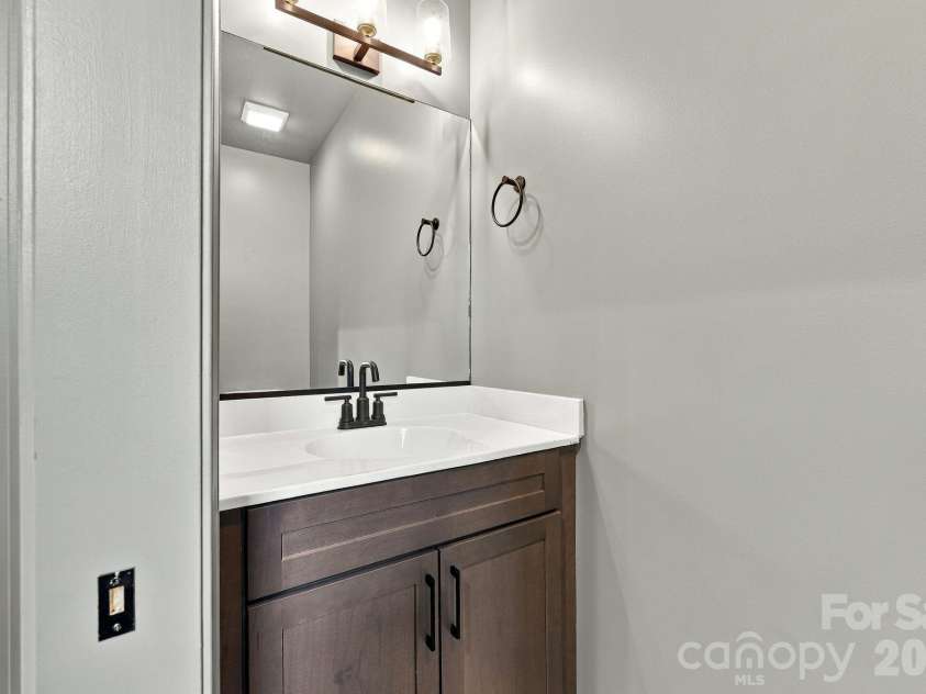 34 Gudger Road, Candler, NC 28715.  MLS# CAR4426999, YatesRealty ID 53579. Mud room and half bath