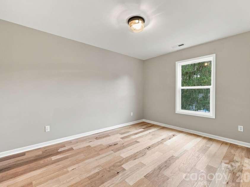 34 Gudger Road, Candler, NC 28715.  MLS# CAR4426999, YatesRealty ID 53579. Second Bedroom Upstairs