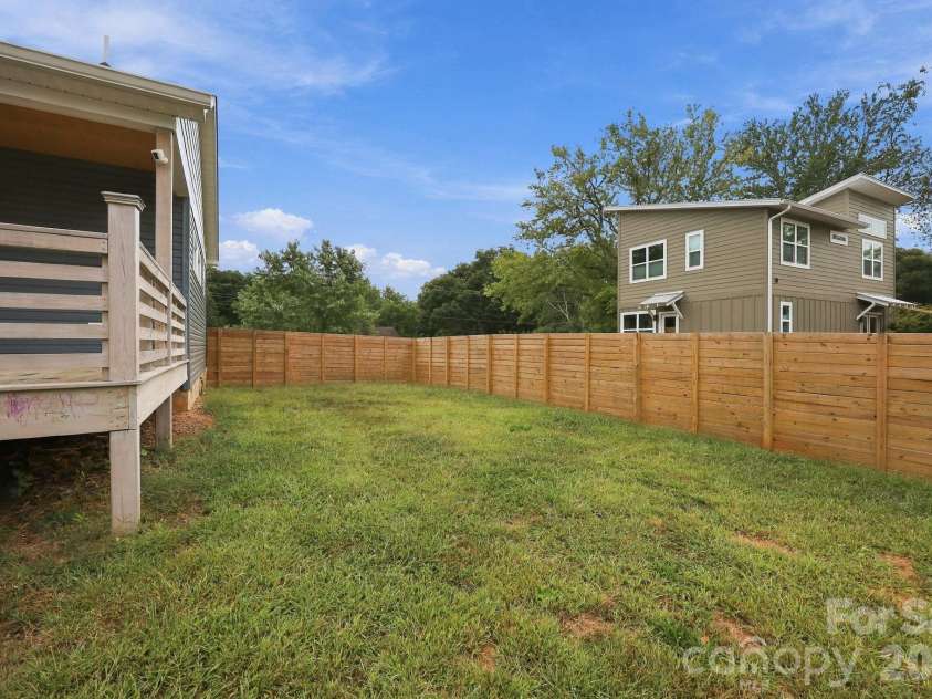 34 Gudger Road, Candler, NC 28715.  MLS# CAR4426999, YatesRealty ID 53579. Spacious Fully Fenced Back Yard