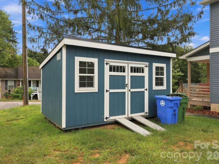 34 Gudger Road, Candler, NC 28715.  MLS# CAR4426999, YatesRealty ID 53579. Storage shed included