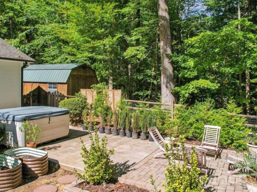 5919 Stonebridge Lane, Waxhaw, NC 28173.  MLS# CAR4427781, YatesRealty ID 53580. Back patio