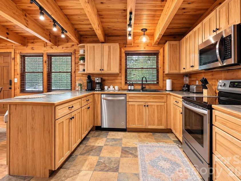 240 Fortner Avenue, Bryson City, NC 28713.  MLS# CAR4429372, YatesRealty ID 53587. 