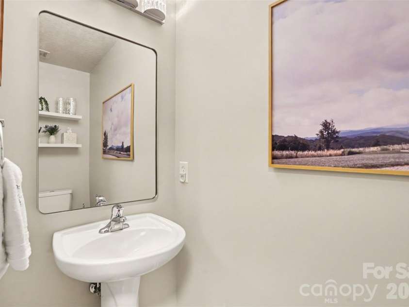 7539 Lady Liberty Lane, Charlotte, NC 28217.  MLS# CAR4428073, YatesRealty ID 53589. Main level half bath
