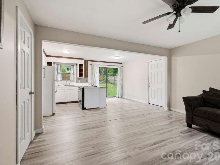 36 Medlin Lane, Flat Rock, NC 28731.  MLS# CAR4428597, YatesRealty ID 53594. Open living area flows directly into the kitchen and dining space for an easy, functional layout.