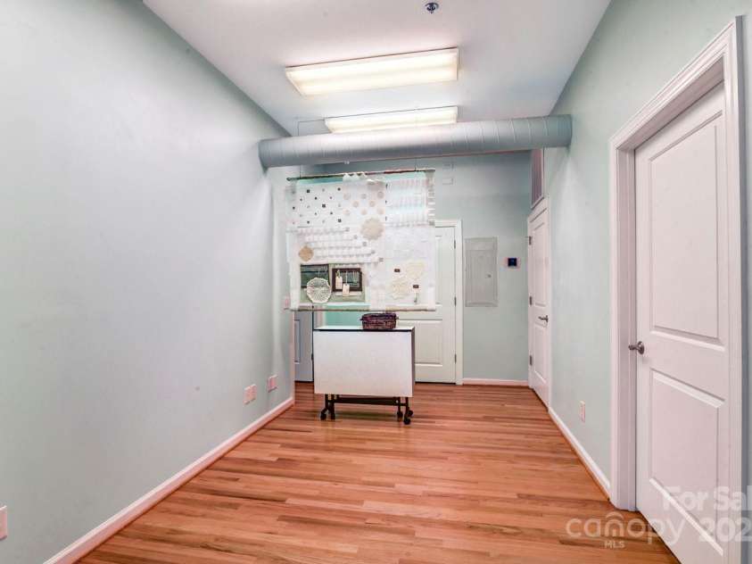 119 Lee Street, Salisbury, NC 28144.  MLS# CAR4216965, YatesRealty ID 536. Central room from Foyer. door at right is to large room shown next.