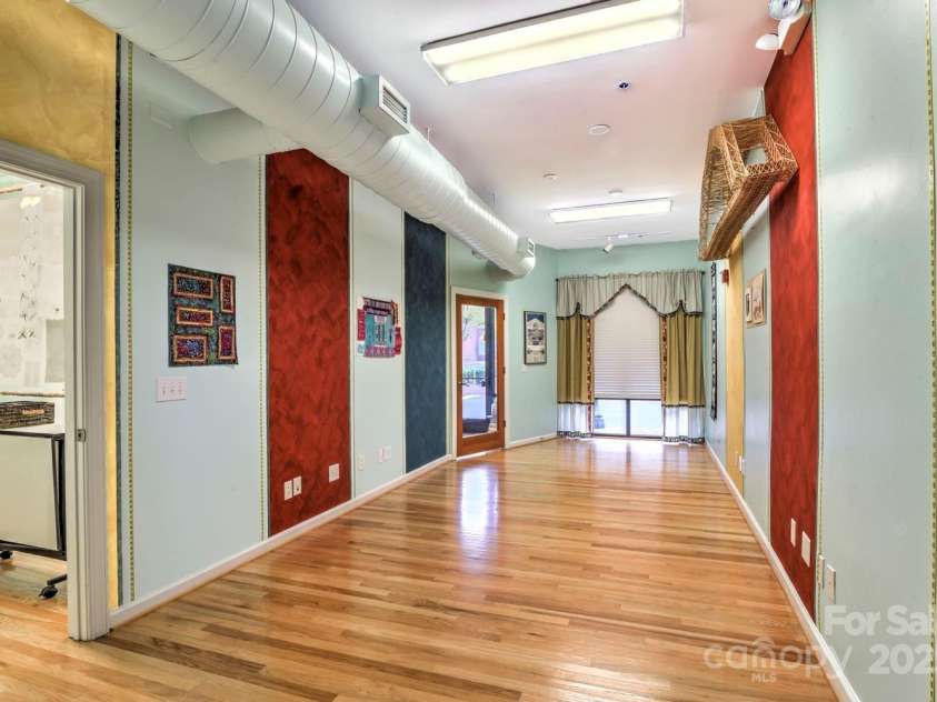 119 Lee Street, Salisbury, NC 28144.  MLS# CAR4216965, YatesRealty ID 536. En Suite Bedroom w/wood floor, access to central room & foyer