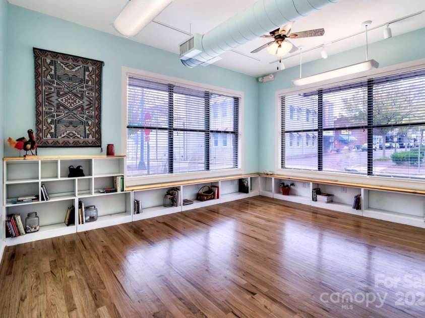 119 Lee Street, Salisbury, NC 28144.  MLS# CAR4216965, YatesRealty ID 536. Living room w/beautiful wood flooring & blt-ins