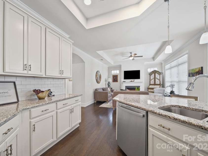 4516 Ideal Way, Harrisburg, NC 28075.  MLS# CAR4325804, YatesRealty ID 536. Beautiful Modern  Kitchen Features White Cabinets & Granite Counters