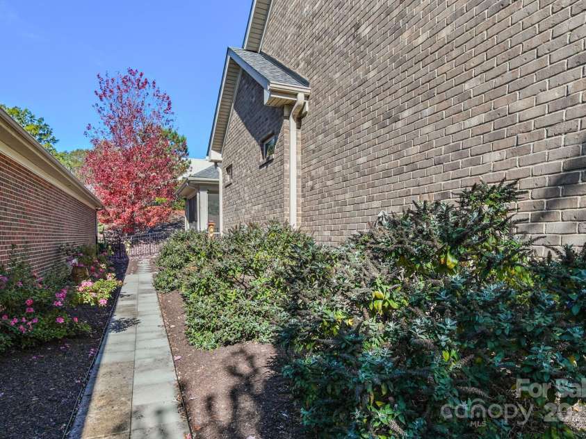 4516 Ideal Way, Harrisburg, NC 28075.  MLS# CAR4325804, YatesRealty ID 536. Side Yard Walkway