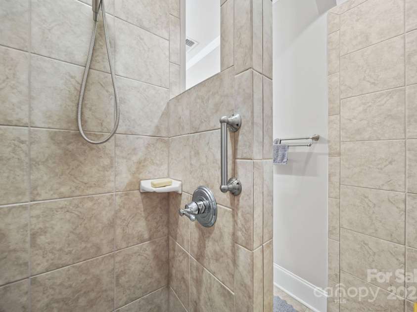 4516 Ideal Way, Harrisburg, NC 28075.  MLS# CAR4325804, YatesRealty ID 536. The Large Owners No Glass Shower makes keeping a clean shower easy