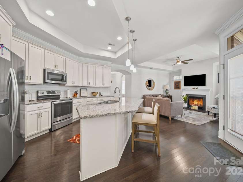 4516 Ideal Way, Harrisburg, NC 28075.  MLS# CAR4325804, YatesRealty ID 536. View of Great Room from Kitchen. Notice the Open Plan