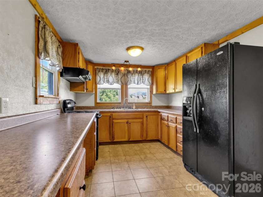 408 Sunny Drive, Waynesville, NC 28786.  MLS# CAR4429563, YatesRealty ID 53614. 