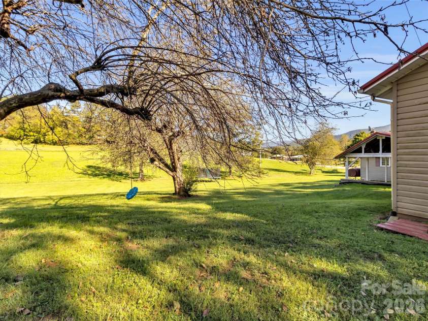 408 Sunny Drive, Waynesville, NC 28786.  MLS# CAR4429563, YatesRealty ID 53614. 