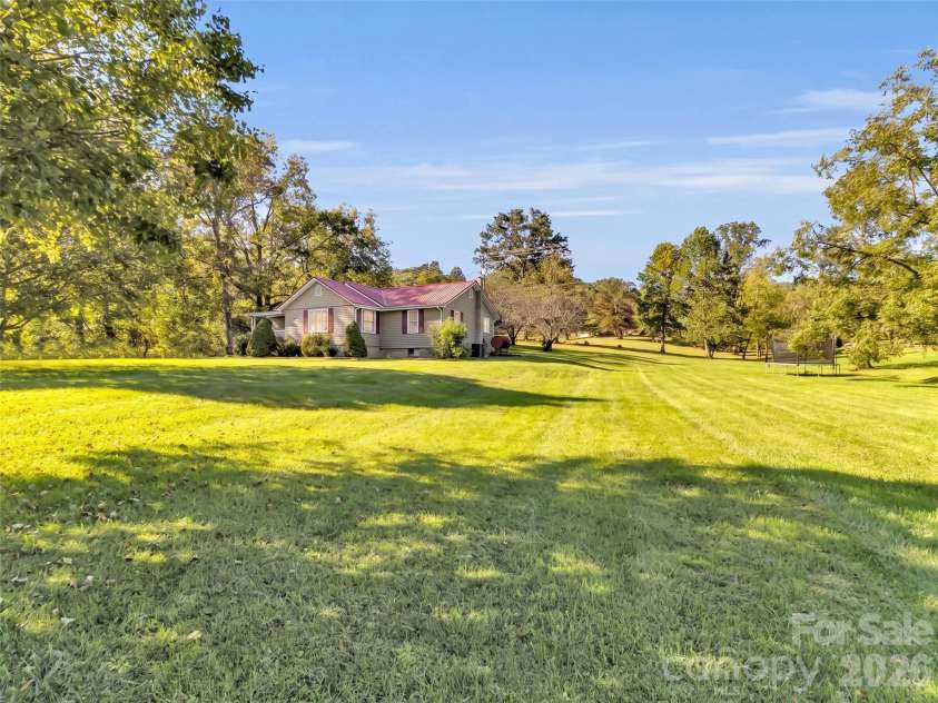 408 Sunny Drive, Waynesville, NC 28786.  MLS# CAR4429563, YatesRealty ID 53614. 