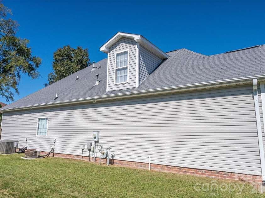 3109 Yates Mill Drive, Concord, NC 28027.  MLS# CAR4425009, YatesRealty ID 53626. Left side of home