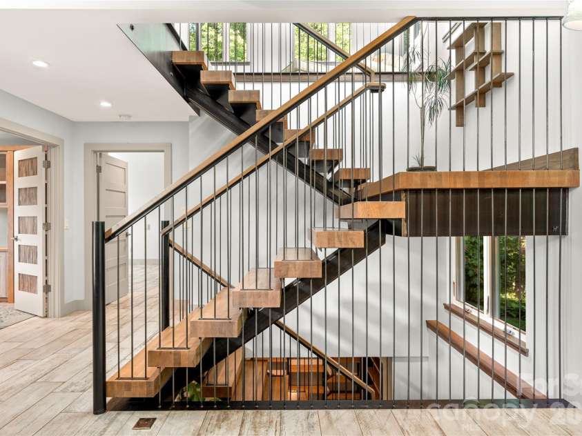 34 Bee Balm Way, Asheville, NC 28804.  MLS# CAR4420482, YatesRealty ID 53633. Custom floating stairs!