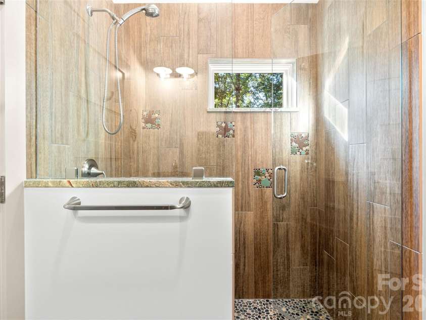 34 Bee Balm Way, Asheville, NC 28804.  MLS# CAR4420482, YatesRealty ID 53633. Custom tile in the walk in shower